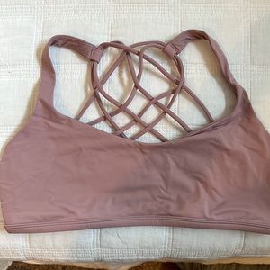 Lululemon sports bra size 10 mauve in color